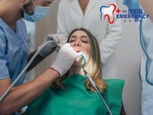 Dentist performing a Root Canal procedure on a patient at The Dental Emergency Room